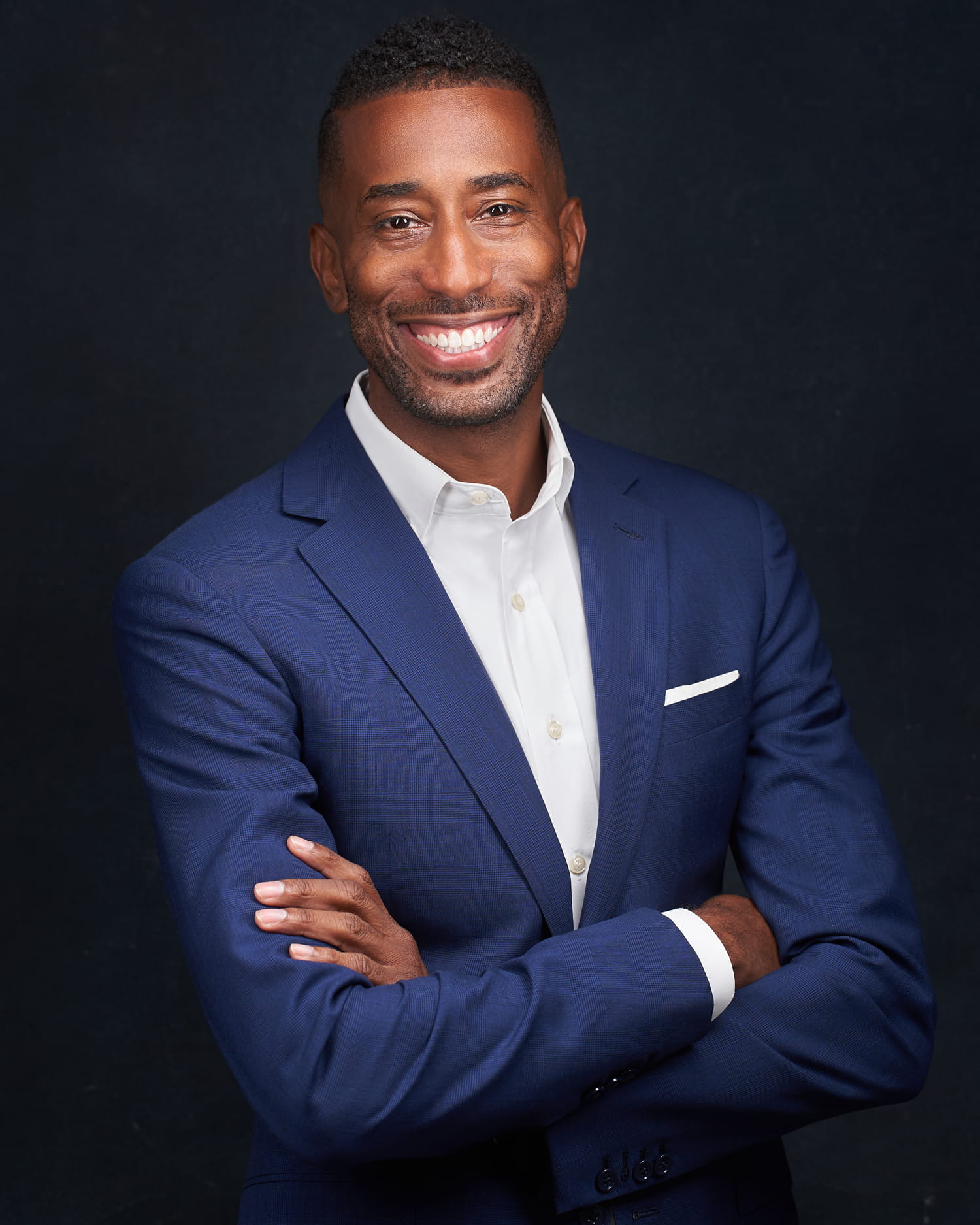 Professional headshot example showing the quality difference compared to DIY attempts